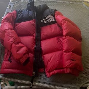 Red and black north face coat